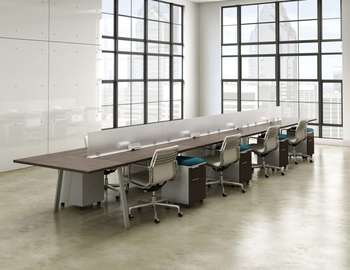 open office benching system in window filled office