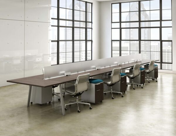 open office benching system in window filled office