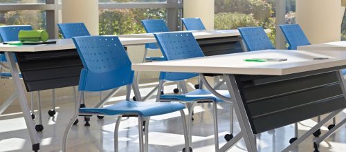 Blue Sonic Stacking Chair In Classroom Training Setting
