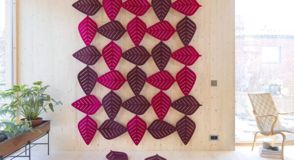 Studio shot of Airleaf acoustics along a wall, with 2 different shades of magenta.